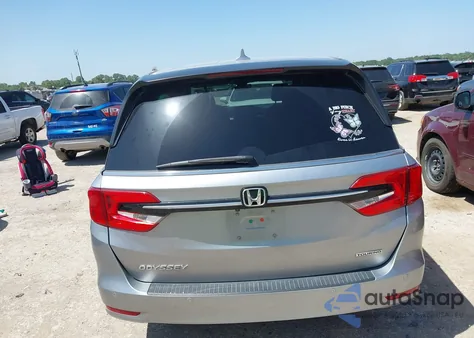 2022 Honda Odyssey Touring z USA, uszkodzony, nr VIN 5FNRL6H8XNB025847